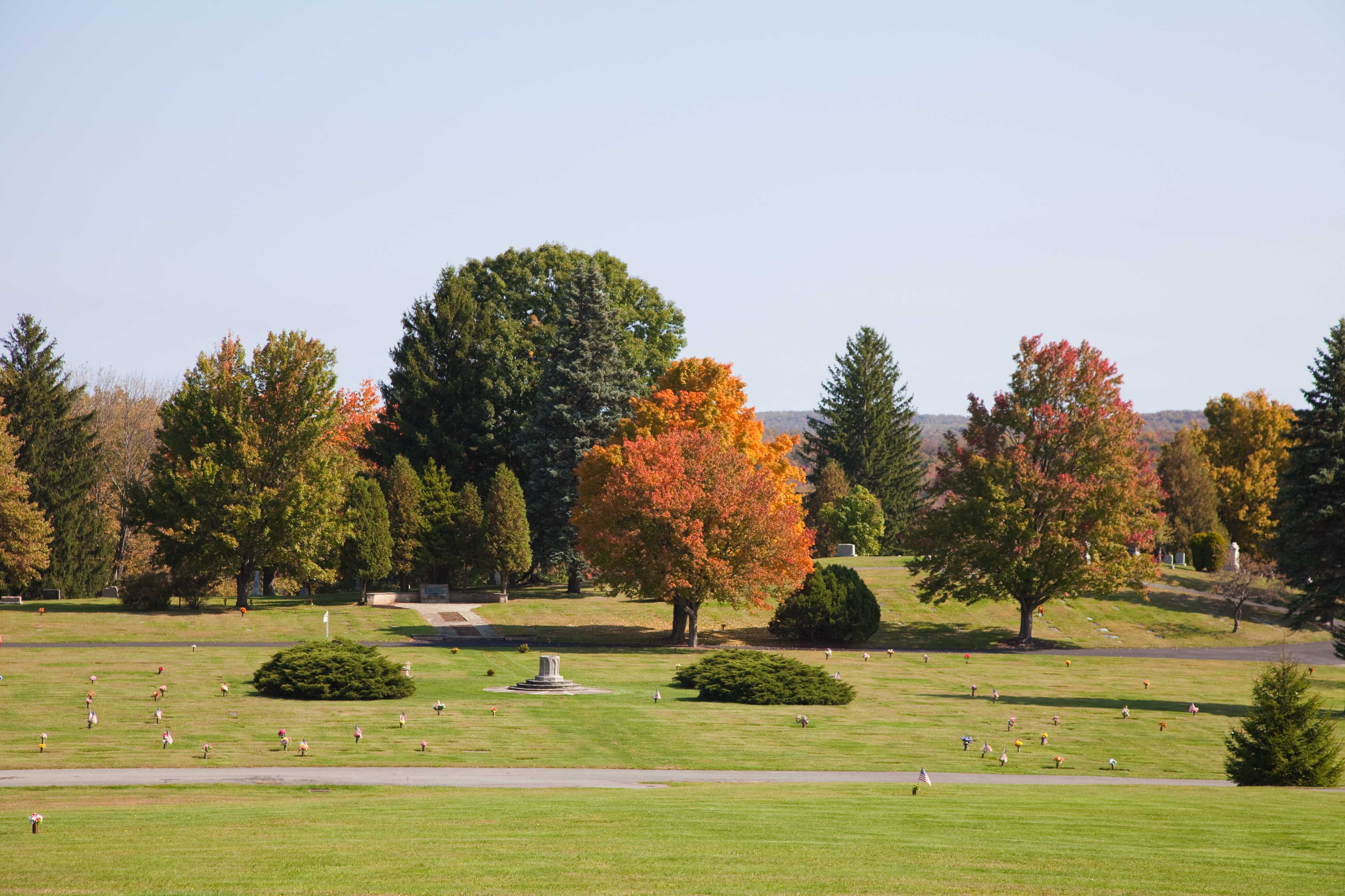 Beautiful memorial park with manicured grounds and mature trees
